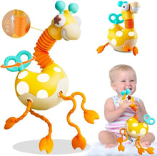 Yellow and white polka dot wind-up giraffe toy with flexible neck and legs being held by smiling baby girl