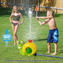 Boy hitting ball with plastic bat while girl watches near green snail water sprinkler toy on lawn
