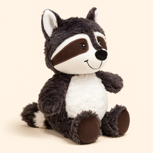 Soft plush raccoon toy with dark gray fur, white belly, and smiling face sitting on light background