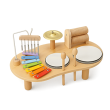 Montessori music table with wooden baby drum and instruments from Toyfetti, promoting sensory play for young children.