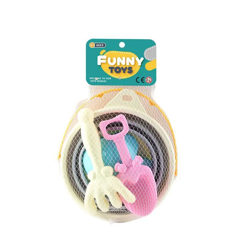 Children's gardening playset with small pink shovel, white rake, and plastic pots inside netted packaging