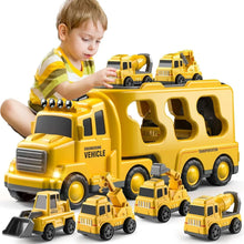 Young child playing with large yellow toy truck and six smaller matching construction vehicles on white background