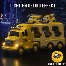 Yellow toy car carrier truck with two smaller construction vehicles on top and illuminated headlights on dark background