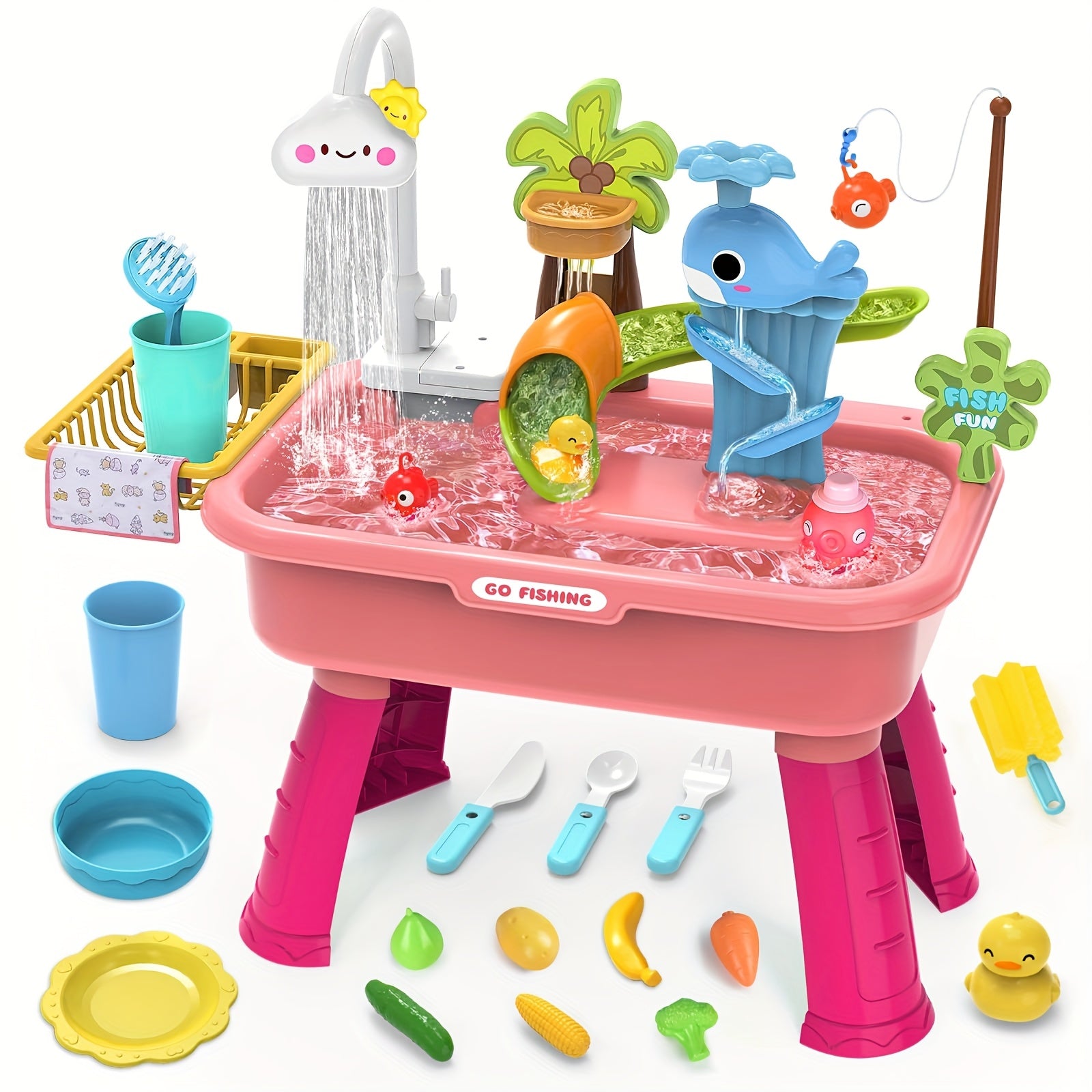 Pink water play table with fishing-themed toys, utensils, and colorful plastic fruit and vegetables scattered around