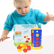 Toddler playing with a colorful Connect 4 Twist & Turn game featuring a blue vertical wheel and red and yellow discs