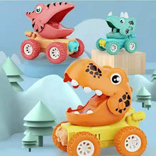 Three colorful dinosaur-themed toy cars with large wheels displayed against a snowy mountain background